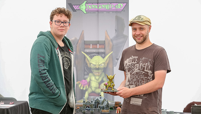 Employees from Hob Goblin 3d holding one of their products